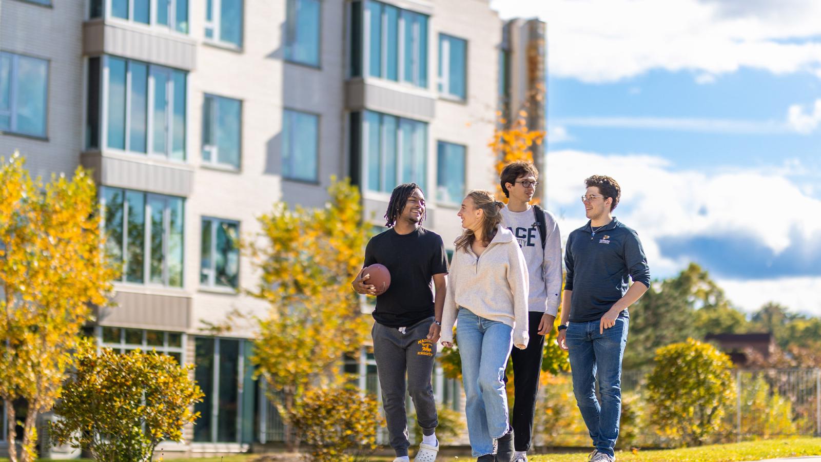 Pace students near Alumni Hall on the Pace Westchester campus