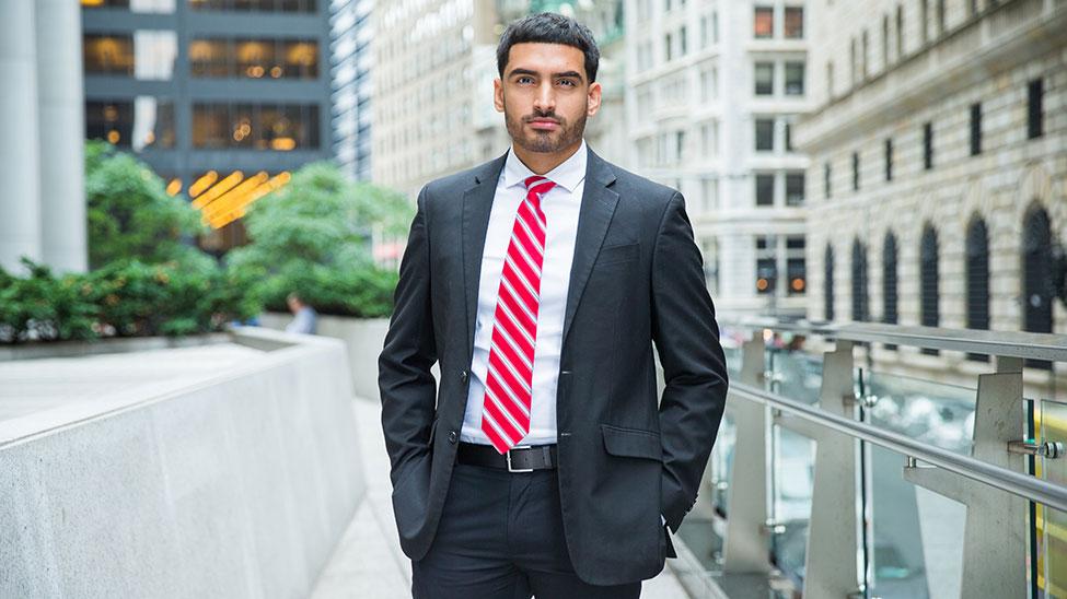 Male student in business attire.