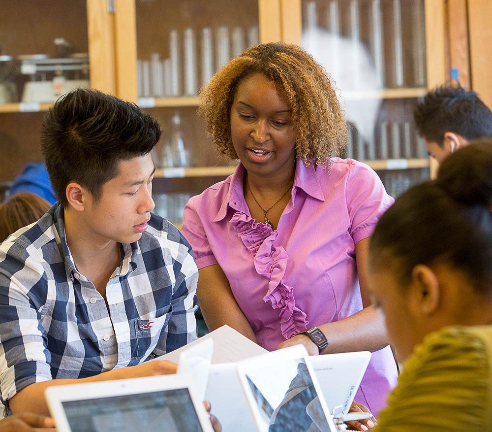 School of Education student working with children in a classroom.