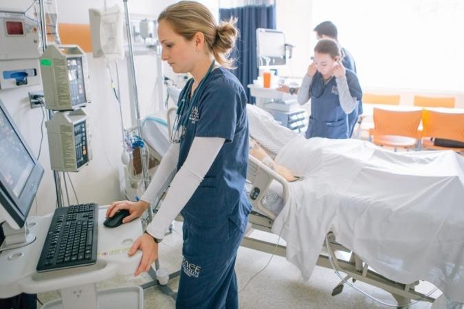 Pace University CHP Lab - photo of nursing student in lab