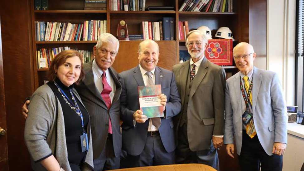 Professor Anna Shostya, Professor Narinder Kakar, Pace University President Marvin Krislov, Professor Nicholas Robinson, Professor Joseph Morreale pose for a picture