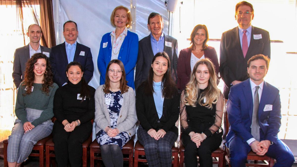 six 2022 KPMG scholarship recipients at the award reception with Professor Barbara Farrell, Dean Singleton, and representives from KPMG. 