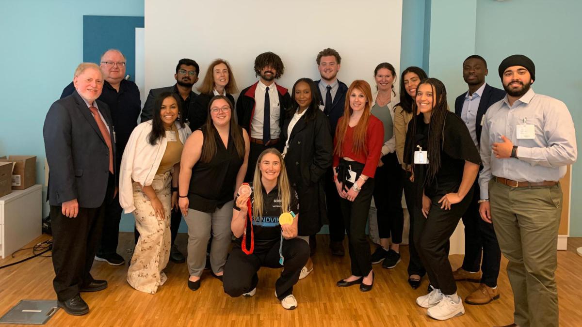 group of Pace University Lubin students with Professors Sandler and Long and Swedish corporate representatives during an office visit in the 2023 field study to Denmark and Sweden