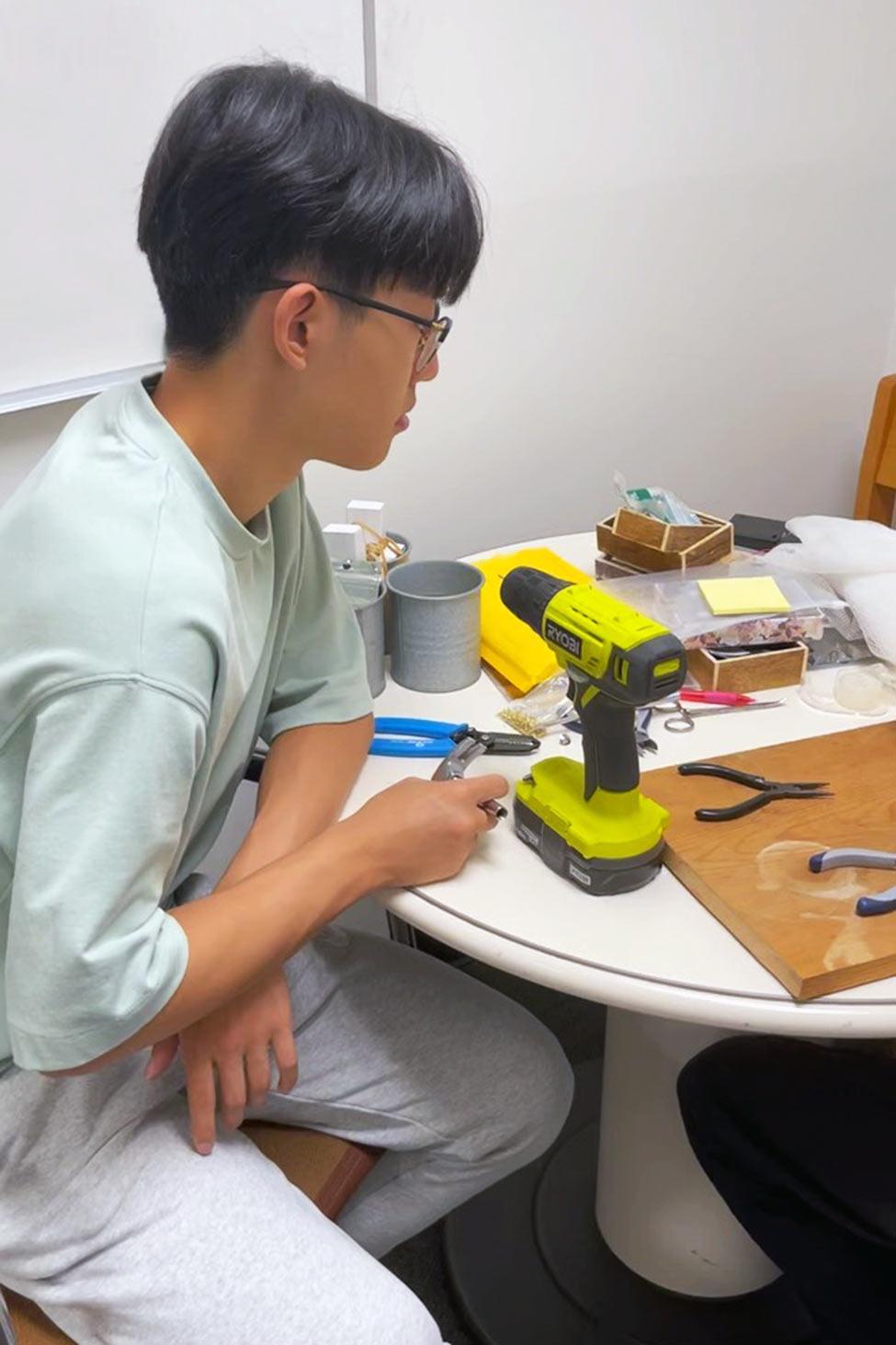 One of Pace University's Mathematics professor Analee Miranda's students working with circuits