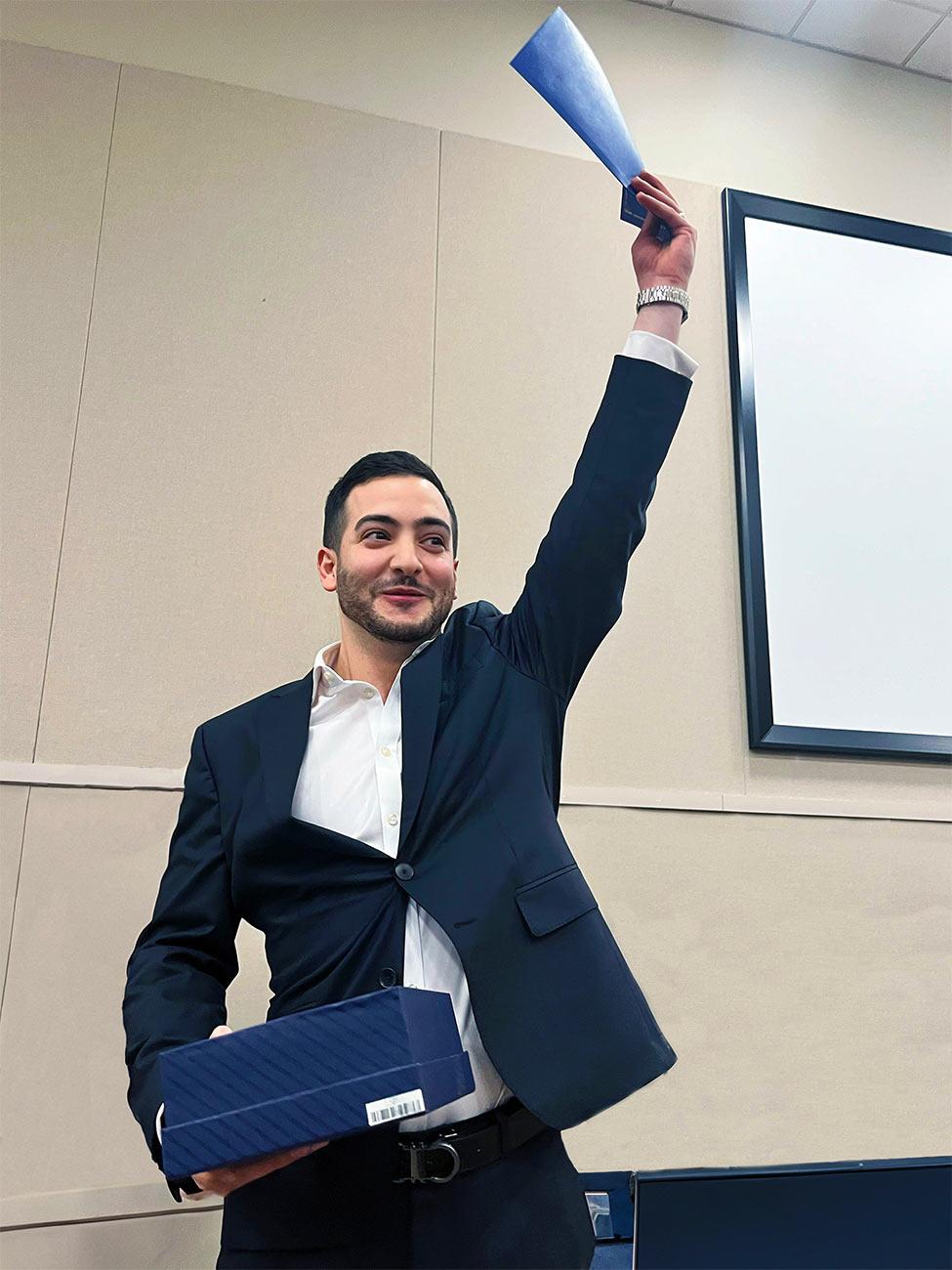 Oz Hasis, PMHNP '23, receiving the Outstanding Student of the Year award at Pace University.