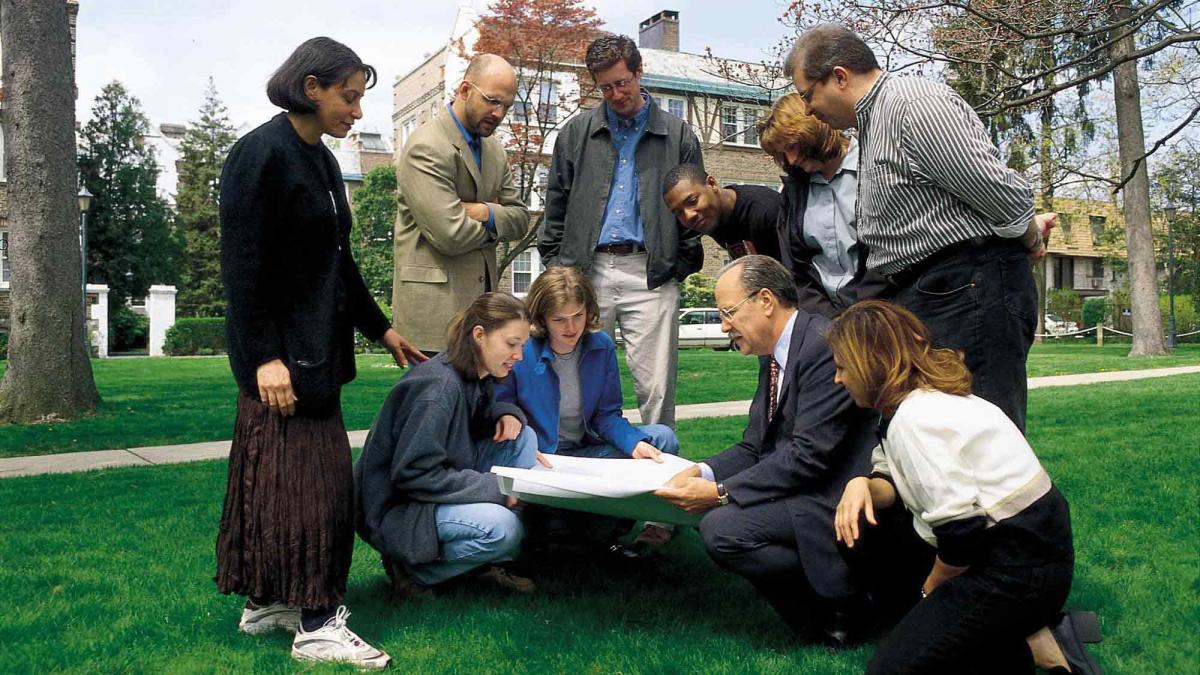 John Nolon and students outside looking at map, Land Use Law Center at Elisabeth Haub School of Law