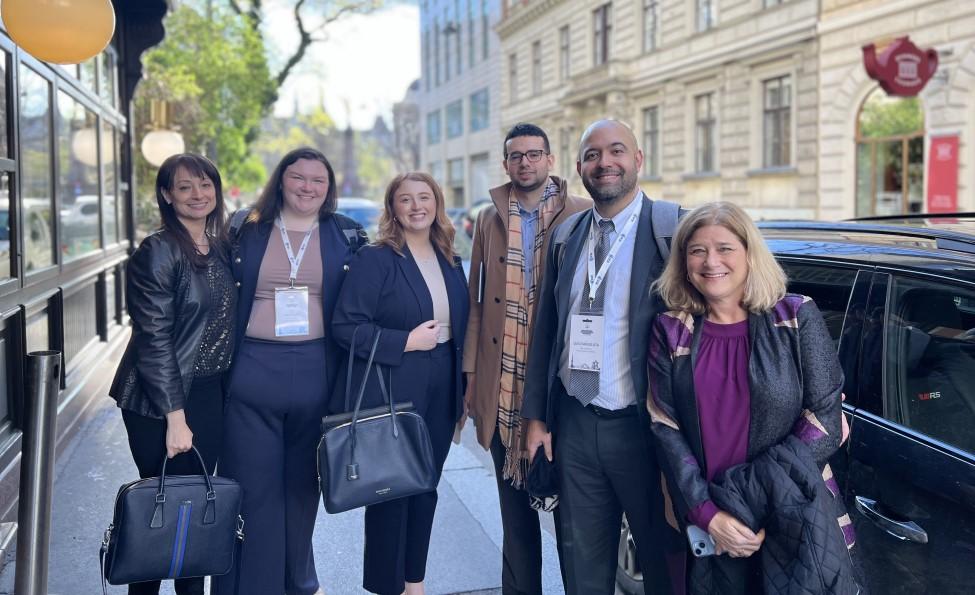 Elisabeth Haub School of Law at Pace University faculty and students standing outdoors in Vienna, Austria