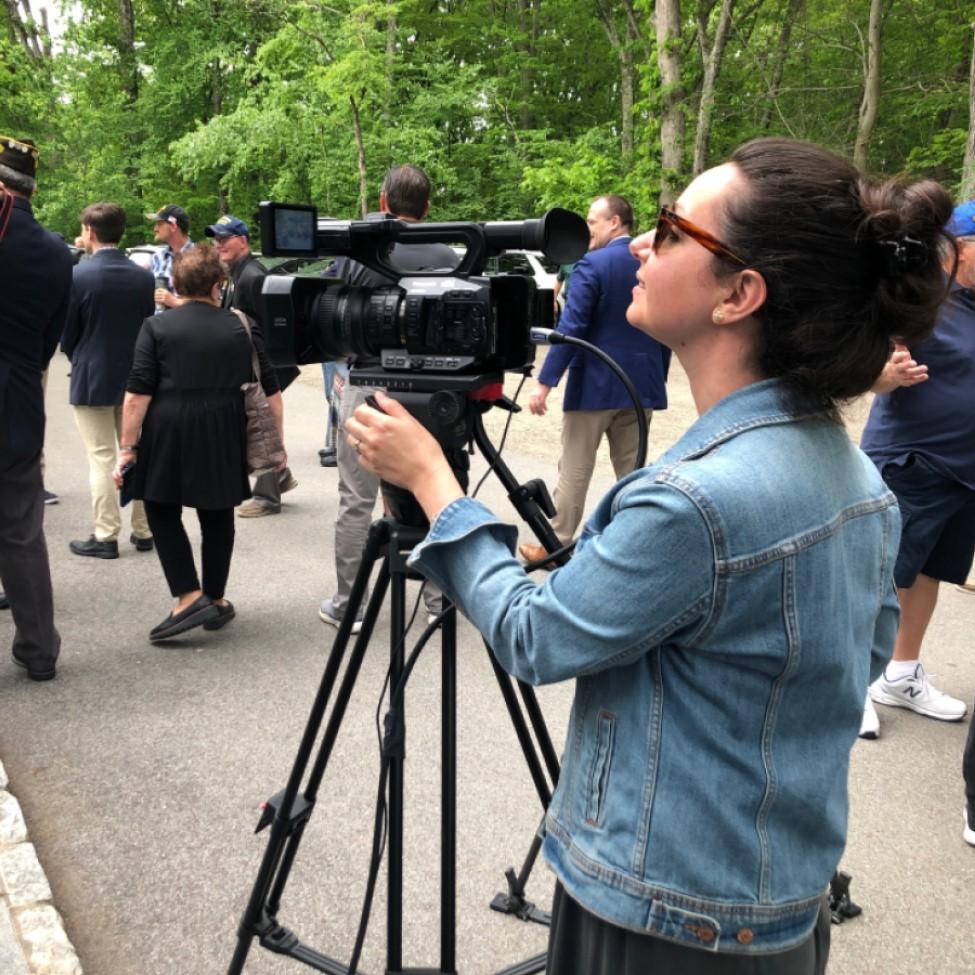 Elisabeth Haub School of Law alumna Catherine Cioffi '12 standing behind camera