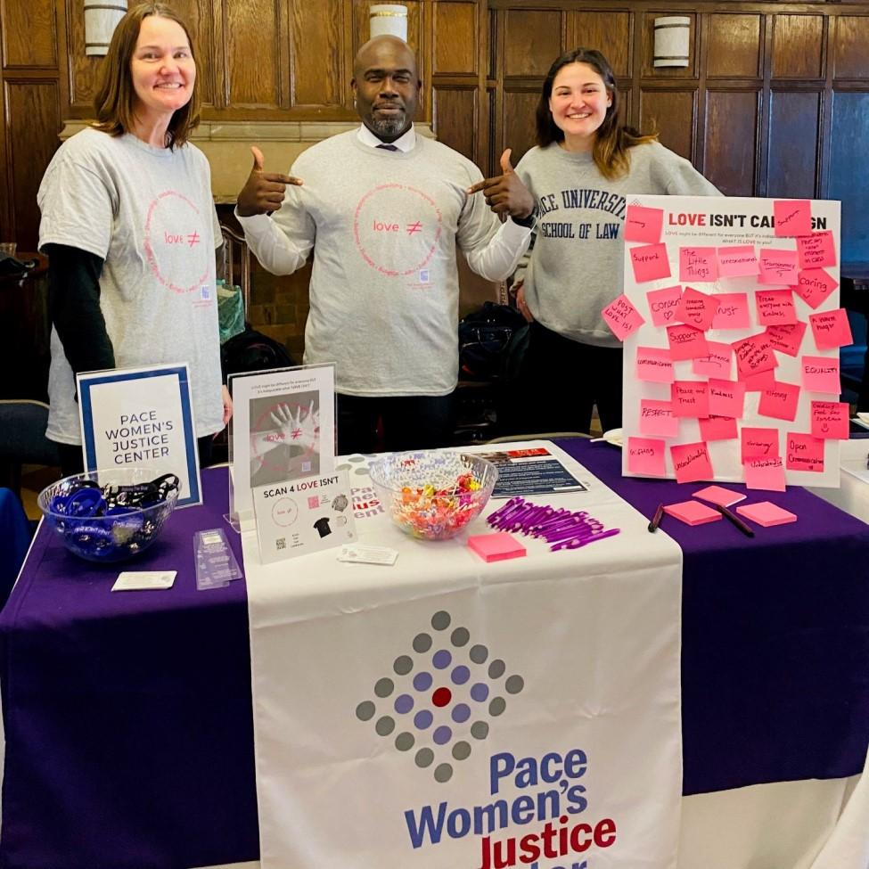 Dean Horace Anderson with Pace Women's Justice Center volunteers in the Tudor Room at Haub Law