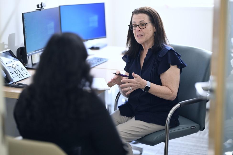 Pace Women's Justice Center staff member speaking to student