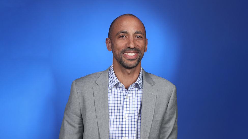 Bernard Dufresne, Assistant Vice President in the Office of Institutional Equity and Title IX Compliance at Pace University, smiling at the camera.