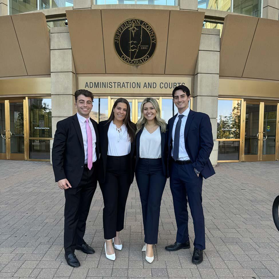 Elisabeth Haub School of Law students  Madison Lane, 3L Steven Caputo, 2L Alexa Saccomanno and 2L Carlos Erazo, outside Colorado Law School