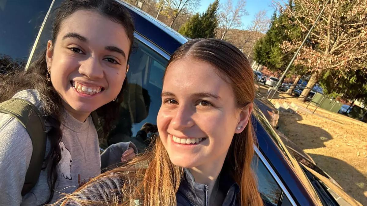 Two Pace University students take selfie while using commuter rideshare program.