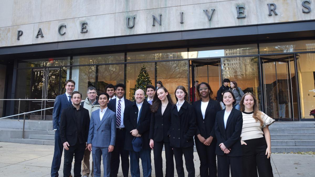 Pace University’s President Marvin Krislov with the 2024 Federal Reserve Challenge Team.