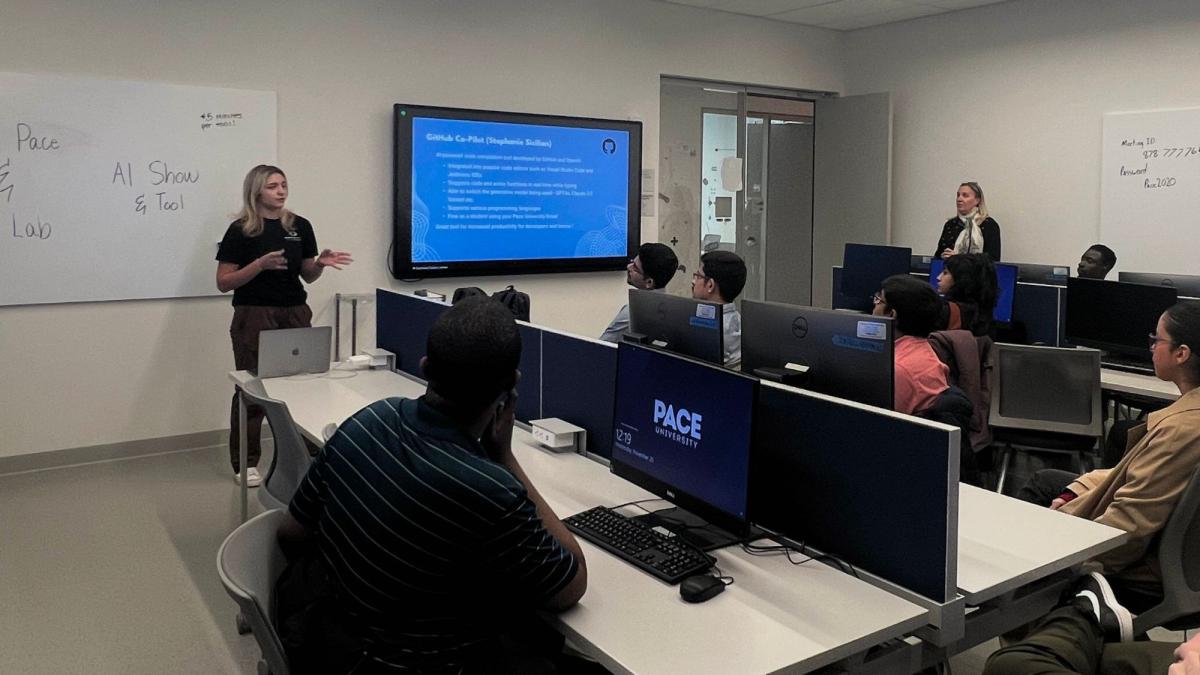 Stephanie Sicilian, student at Pace University's Seidenberg School of CSIS presenting at the AI Show and Tool workshop to a room full of students.