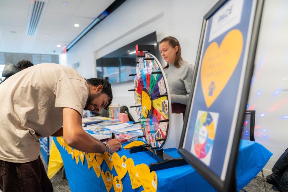 Student and Staff at Pace University's Wellbeing Fair at the New York City campus.