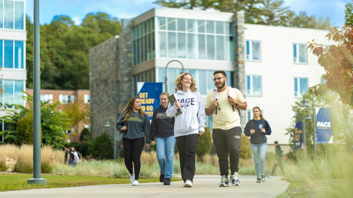 Students chatting and walking on Pace University's Pleasantville Campus