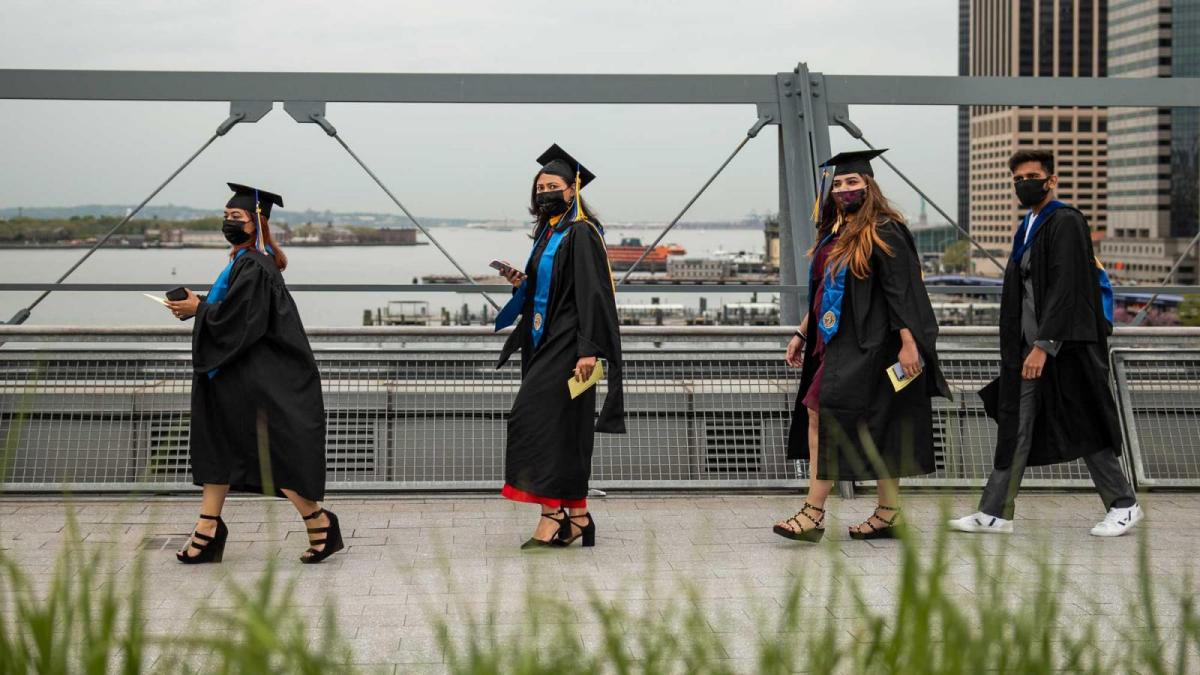 Students walking for Pace University 2021 graduation.