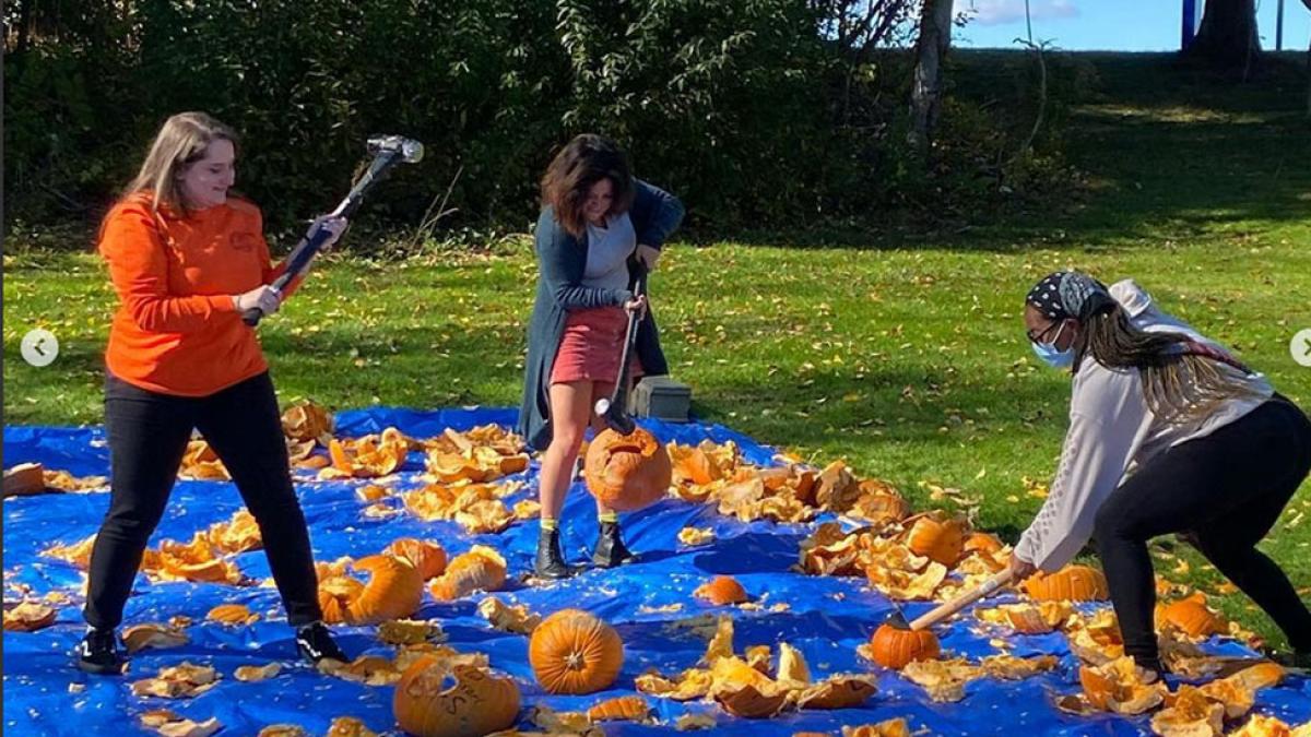 girls smashing pumpkins