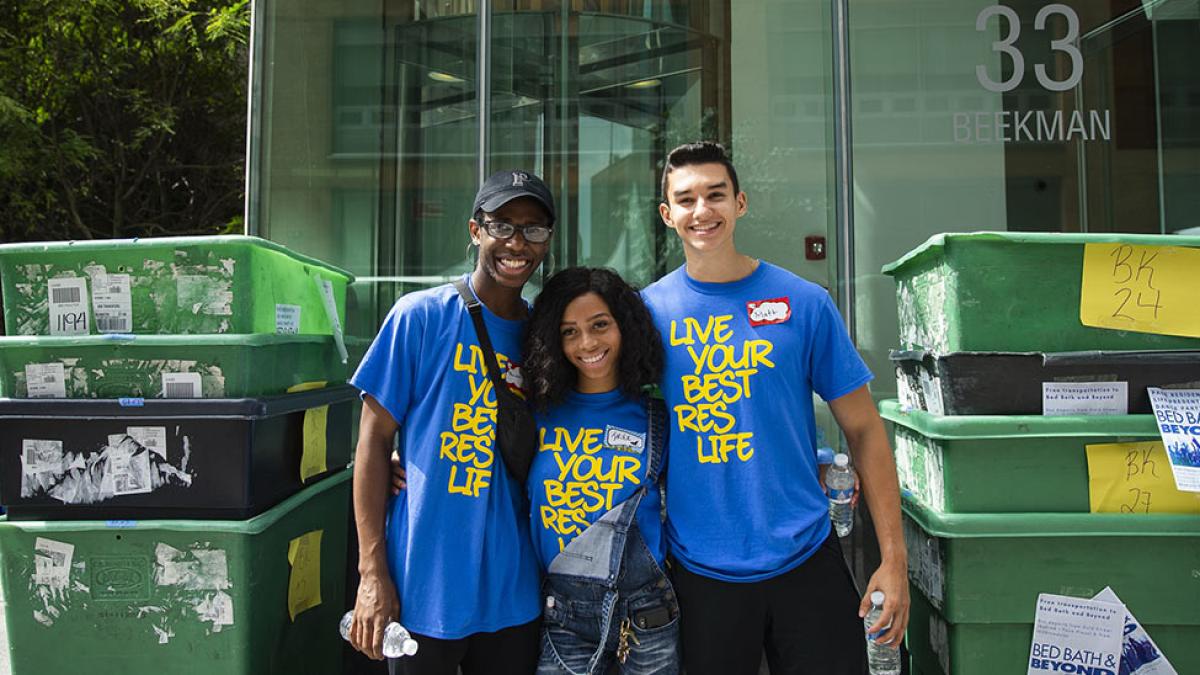 students with moving bins