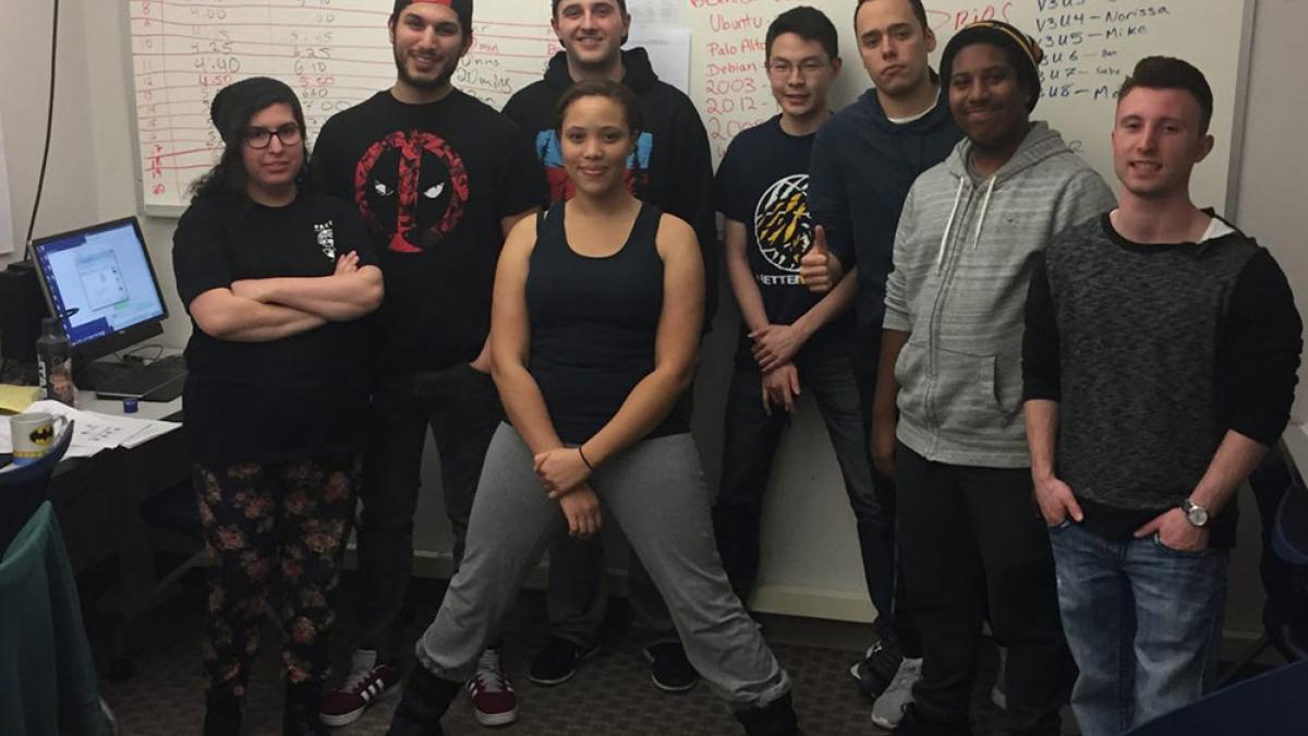 Group of Seidenberg students smiling at the camera.