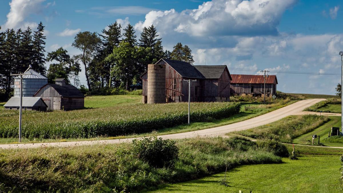 country road, barn, silo, and farm buildings in Iowa