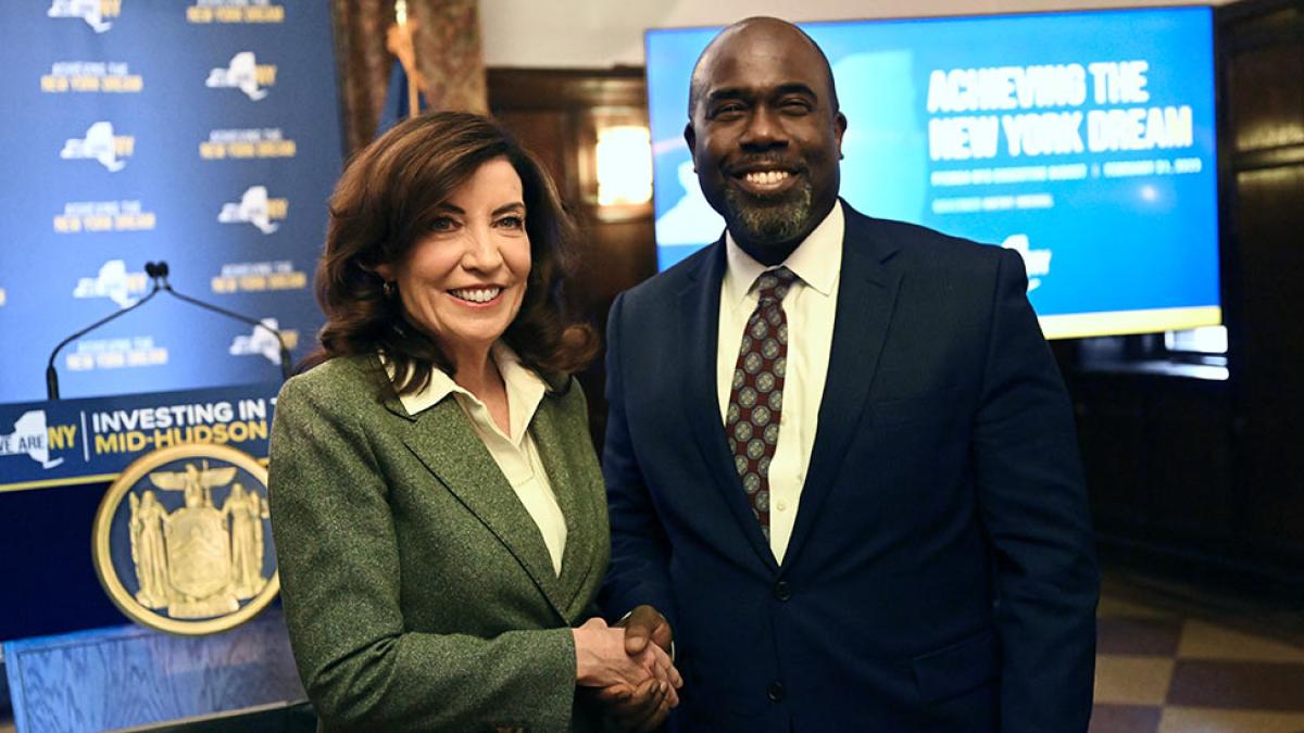NYS Governor Kathy Hochul shaking hands with Horace Anderson, dean at the Elisabeth Haub School of Law in White Plains NY.