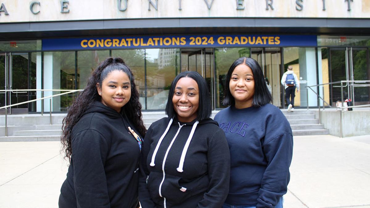 Nisha Troupe, Anjienna Lowtan, and Danielle Hanson standing in front of One Pace Plaza