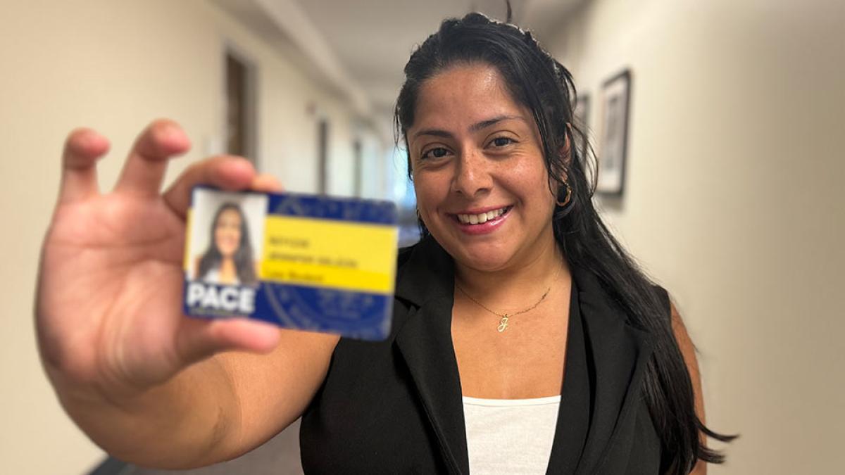 person holding id card at Elisabeth Haub School of Law at Pace University, White Plains