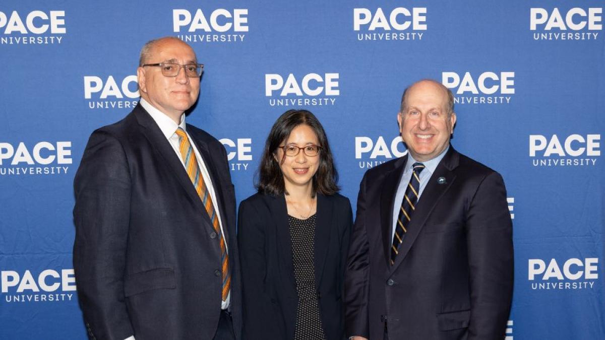 Seidenberg Interim Dean (in the middle of the photo) Dr. Li-Chiou Chen posing for a photo with Interim Dean Provost Dr. Jonathan Hill (to her left) and Pace President Marvin Krislov (to her right.)