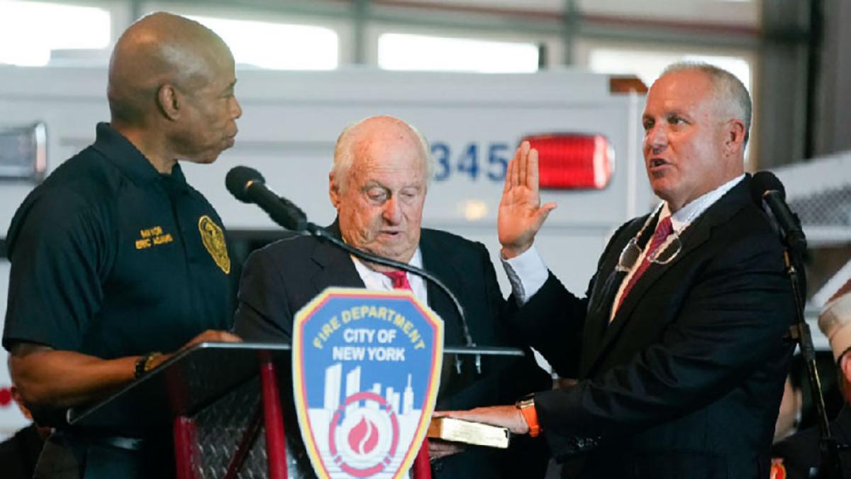 Robert Tucker being sworn in as the 35th Fire Commissioner of FDNY