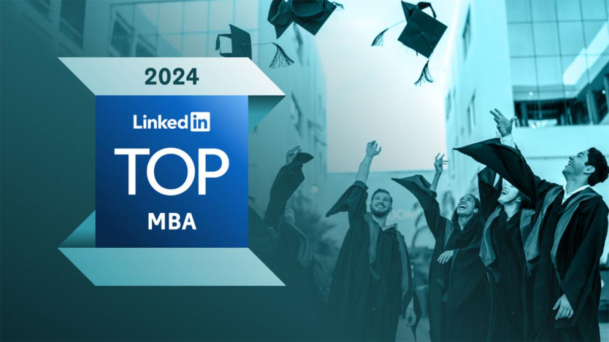 college graduates in gowns tossing graduation caps with badge with words '2024 LinkedIn Top MBA' 