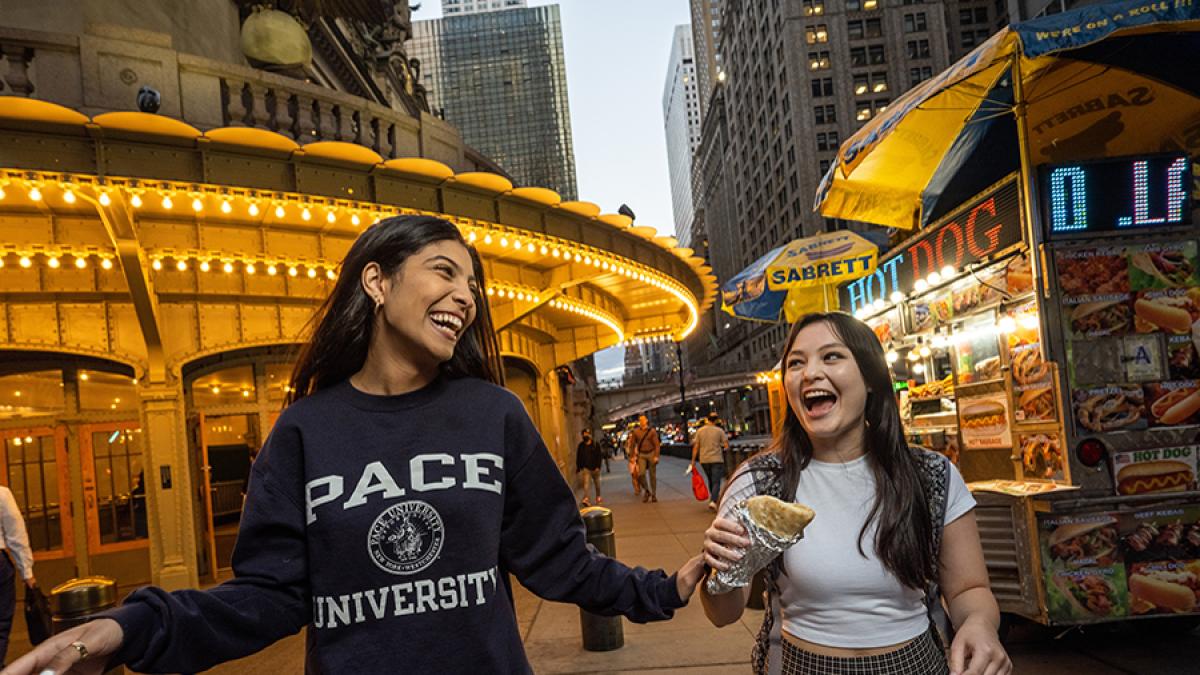 Two students walking around in New York City 