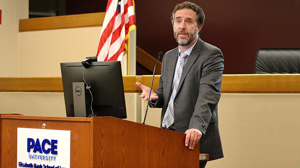 Professor Justin Pidot delivering the annual Gilbert and Sarah Kerlin Lecture on Environmental Law at the Elisabeth Haub School of Law.