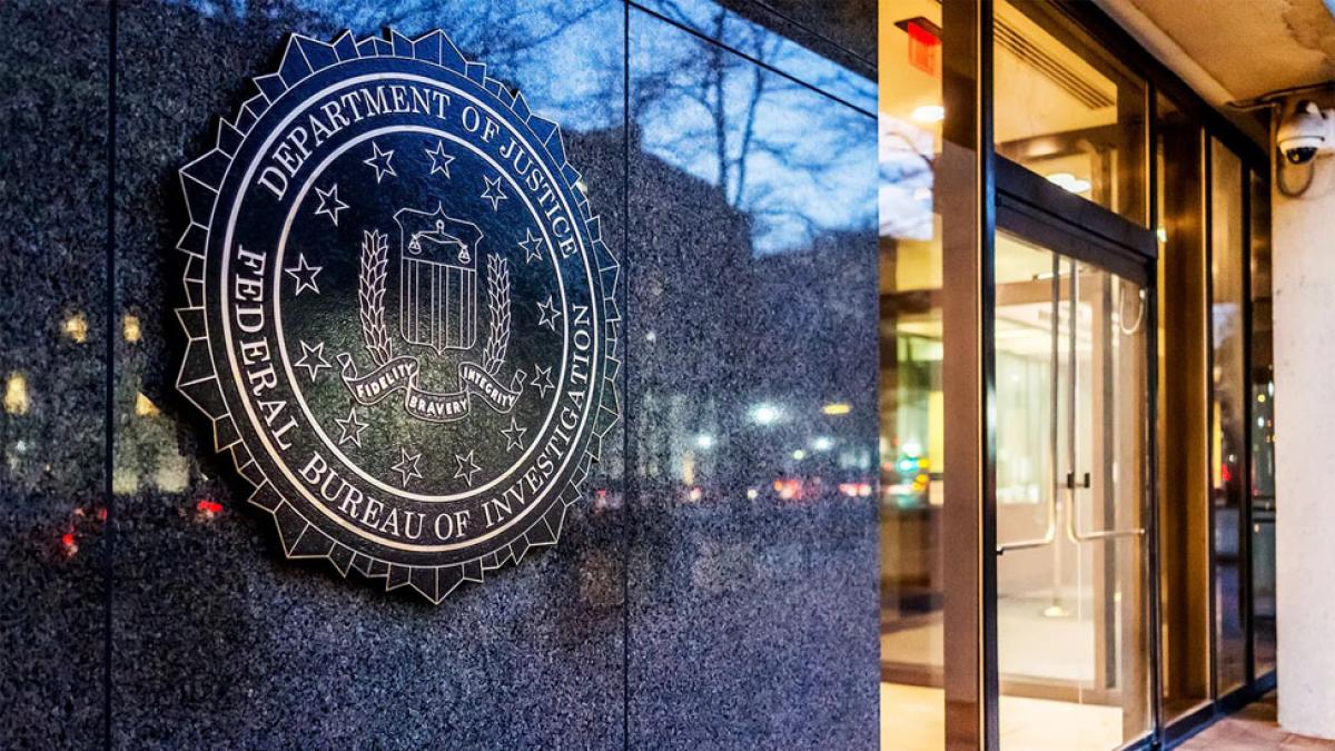 FBI shield near entrance on the wall of federal FBI headquarters in Washington DC