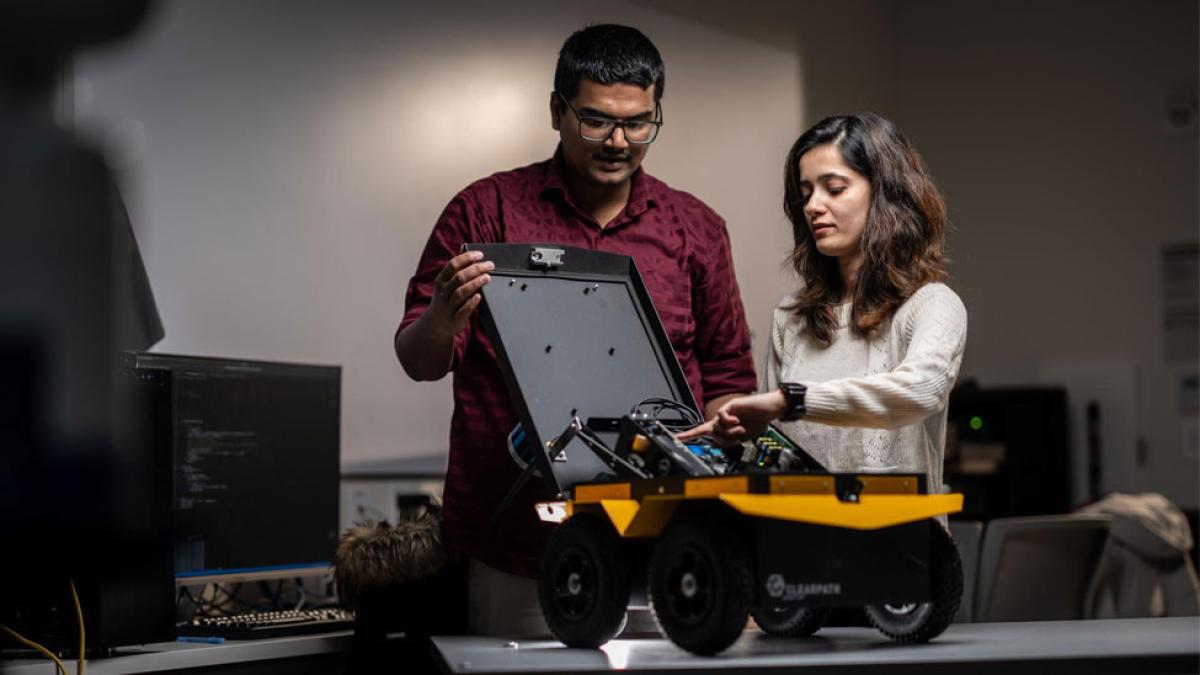 Pace Seidenberg students in the robotics lab. 