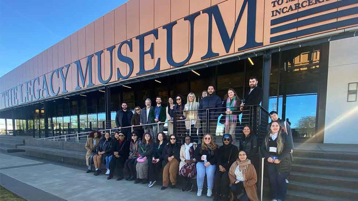 Group photo of Haub Law students and faculty outside of the Legacy Museum