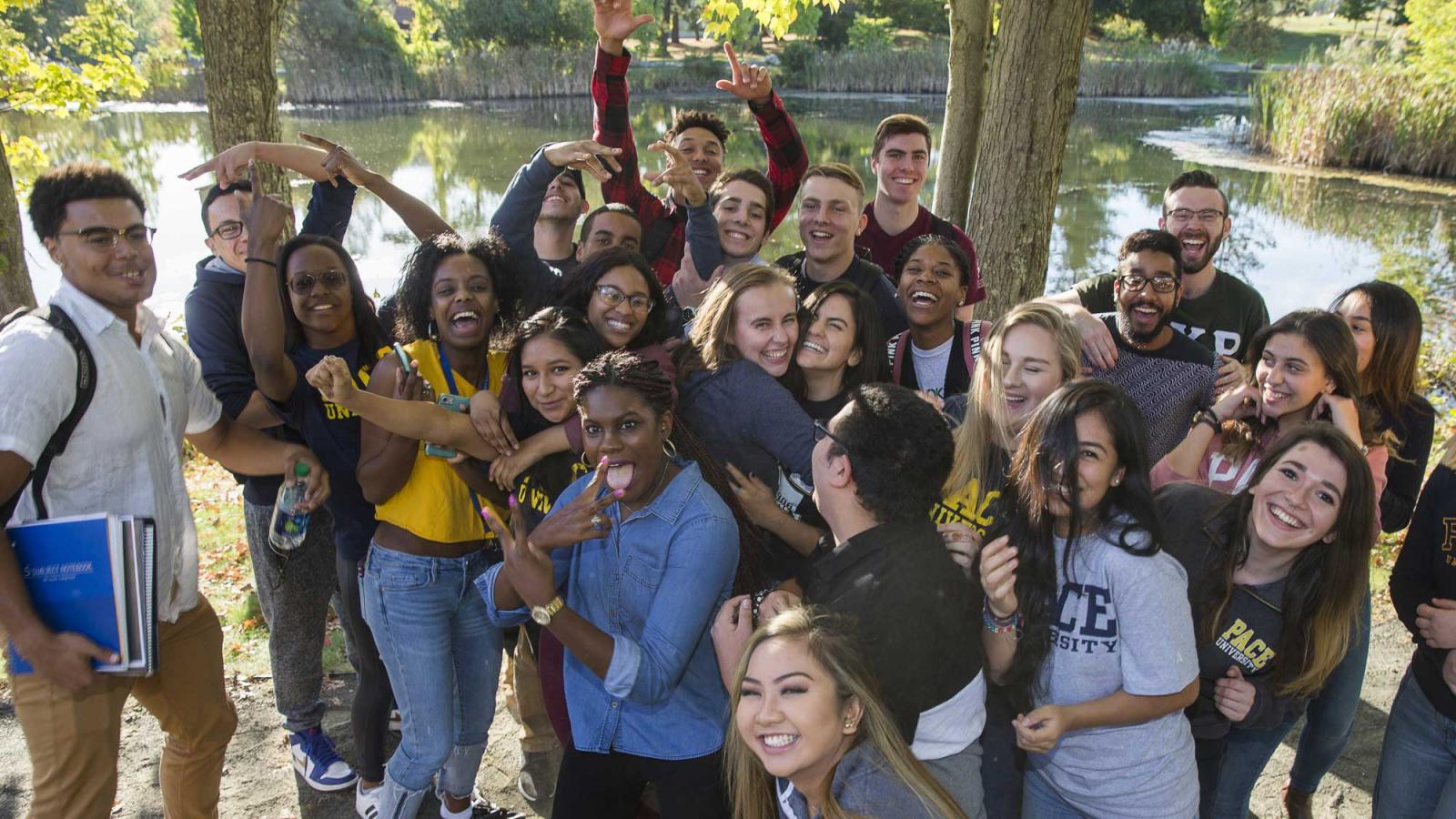 Group of students smiling at the camera.