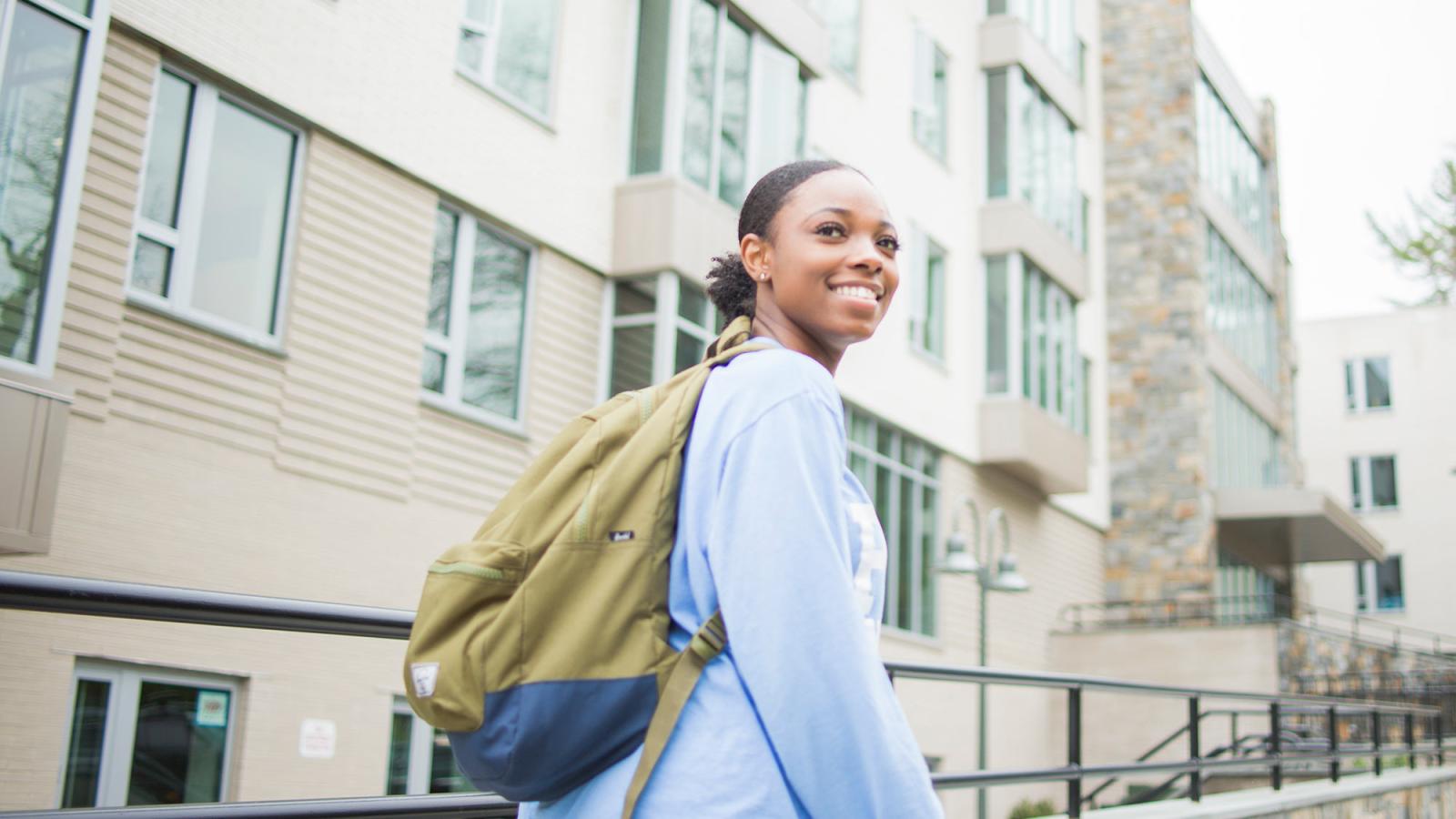 CHP student walking around the Westchester campus.