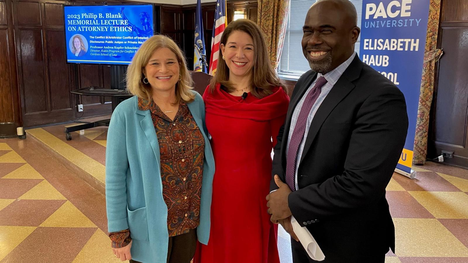 Three individuals pictured at the 2023 Blank Lecture: Professor Jill Gross, speaker Andrea Kupfer Schneider, Dean Horace Anderson