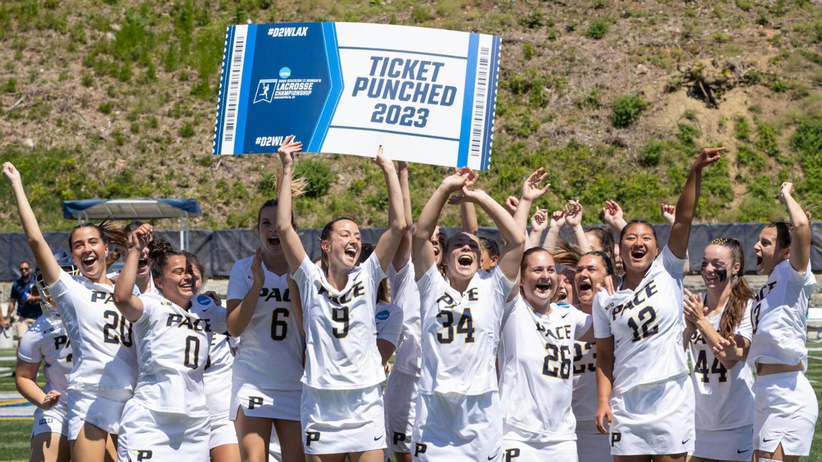 Pace women's lacrosse team celebrating their win over Adelphi