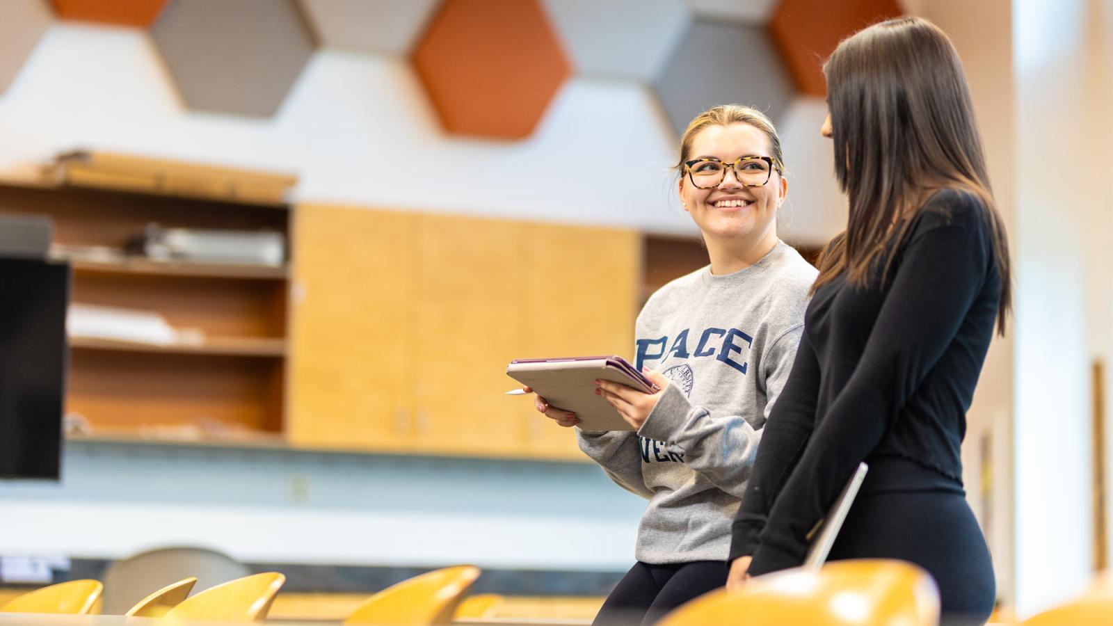 pace students standing in a classroom