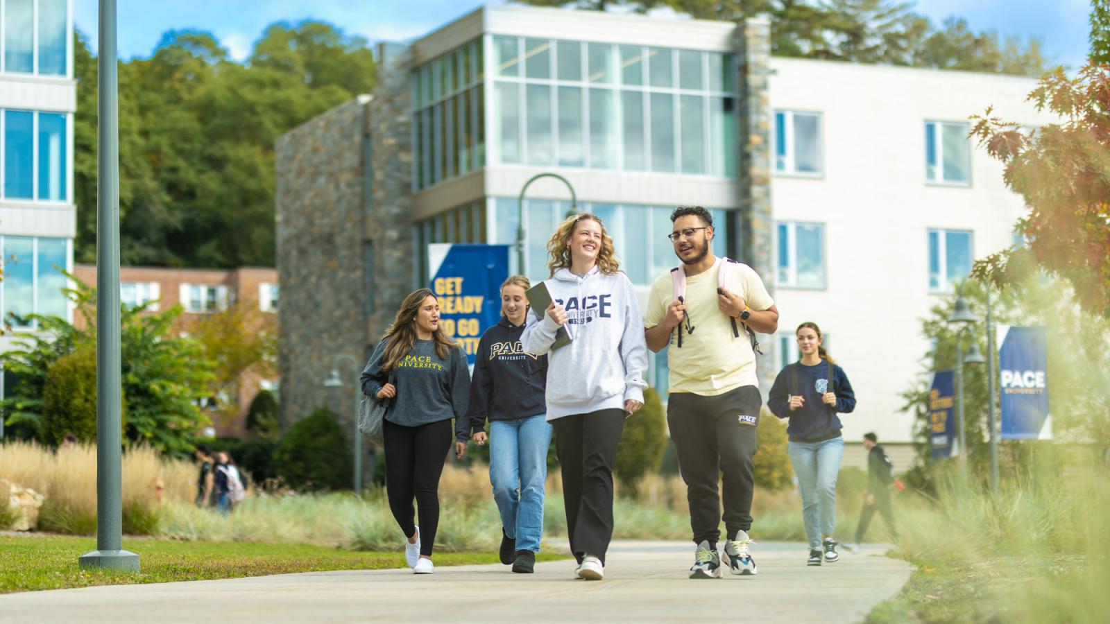 group of students walking on Pace's pleasantville campus. 