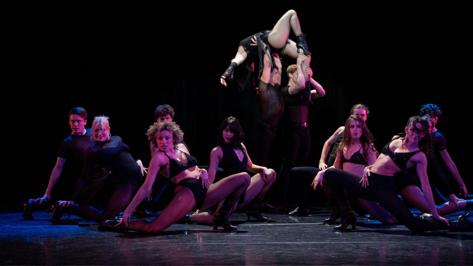 Dancers from the Sands College of Performing Arts performing on stage.
