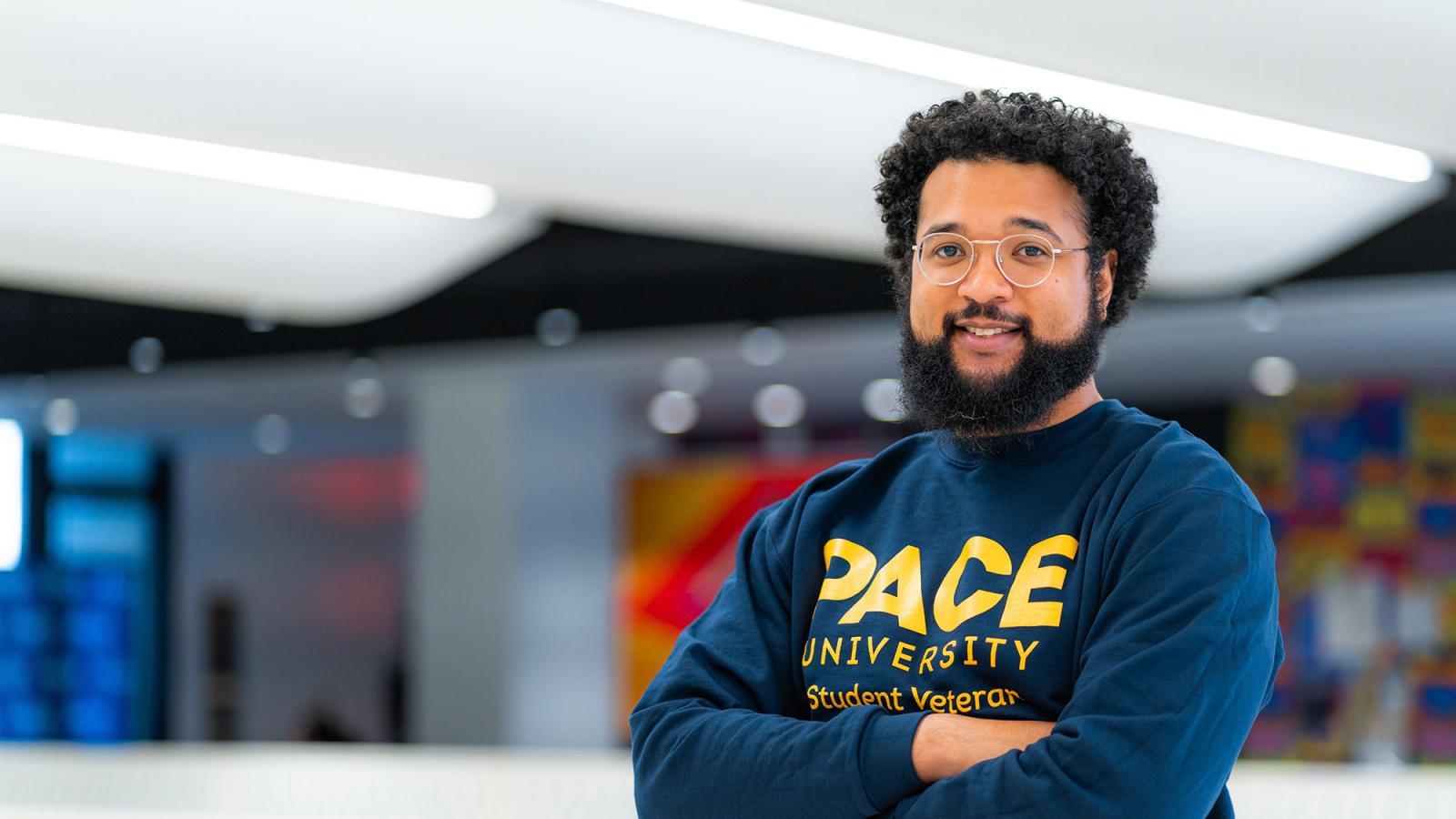 Student veteran with their Pace University-branded clothing