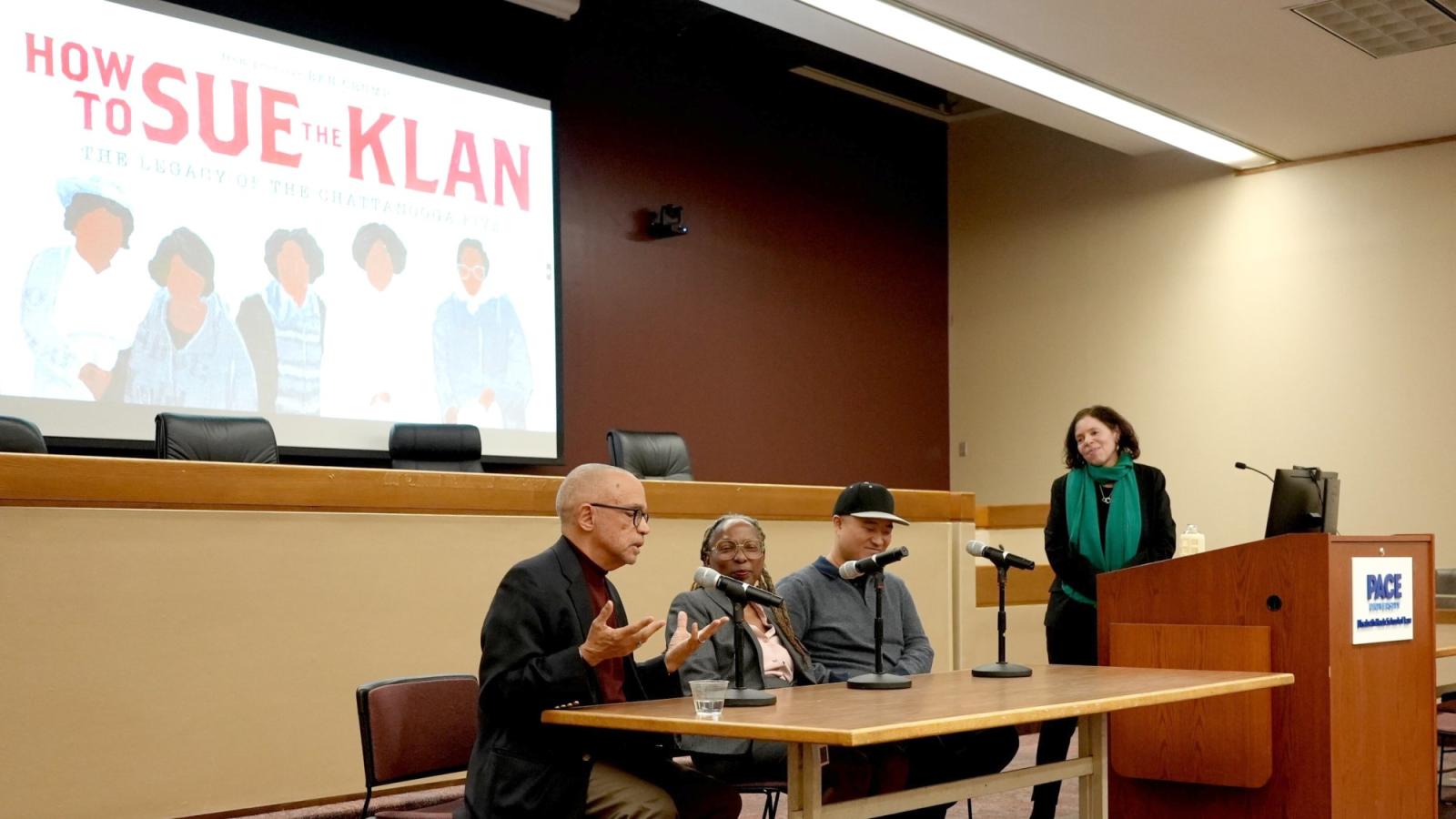 Elisabeth Haub School of Law at Pace University film screening with four presenters speaking at podium