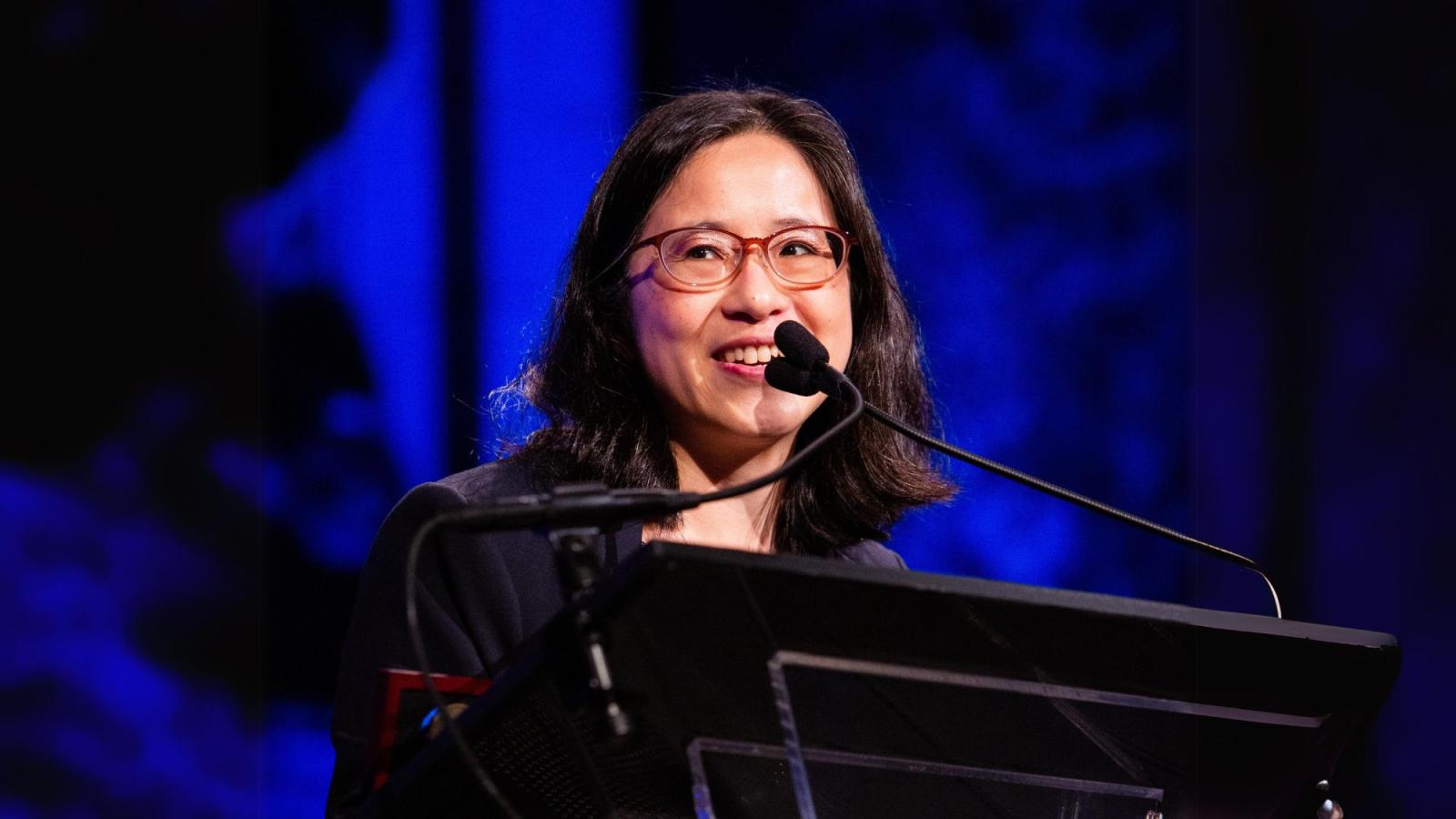 Interim Dean of the Seidenberg School of CSIS at Pace University, Dr. Li-Chiou Chen, standing in front of a podium and giving a speech.