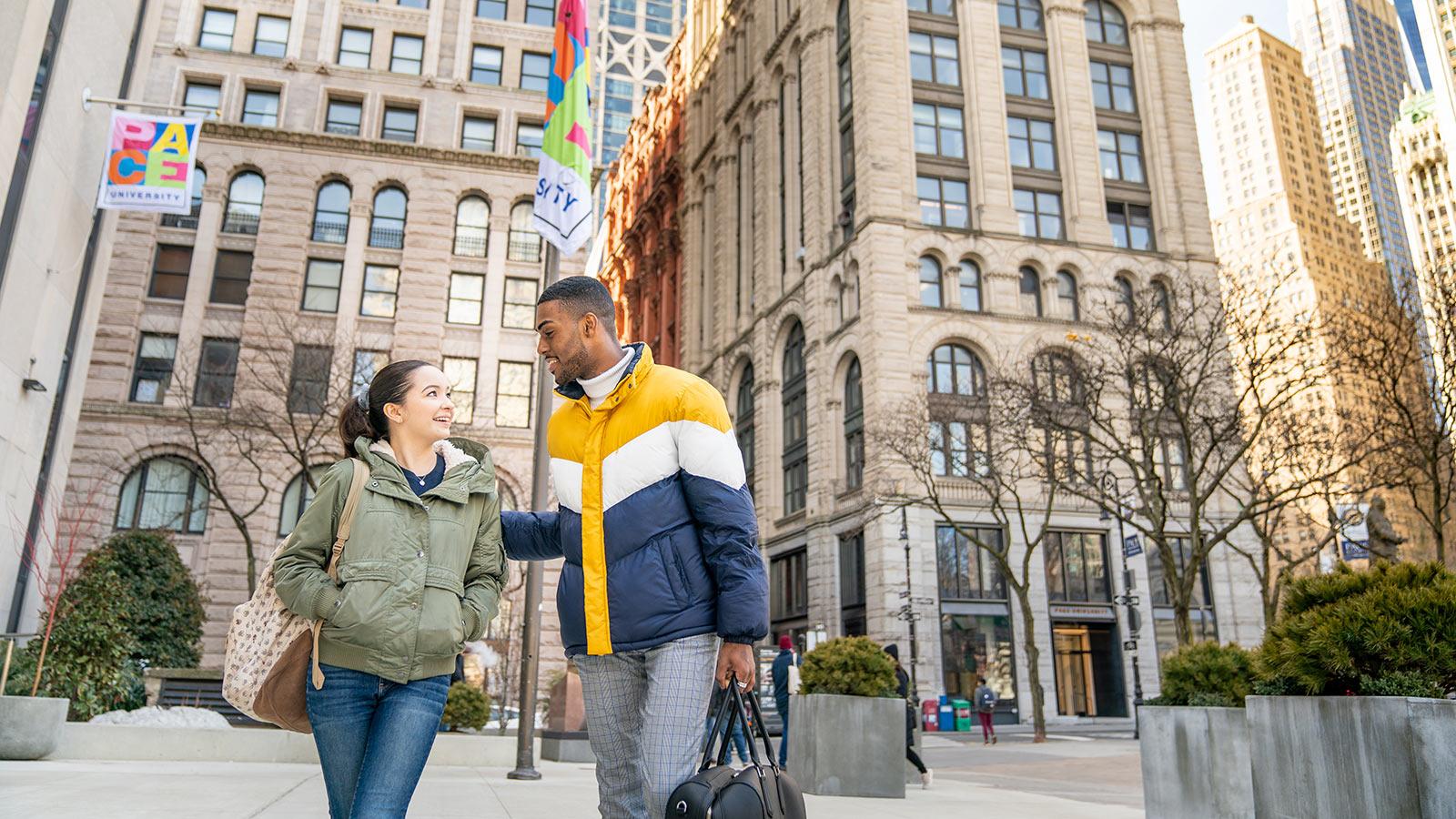 Two pace students walking through Manhattan