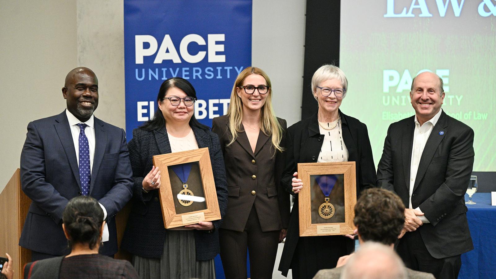 Rena Lee, and Kristina Maria Gjerde accepting the 2024 Haub Award alongside Dean Horace Anderson and President Marvin Krislov