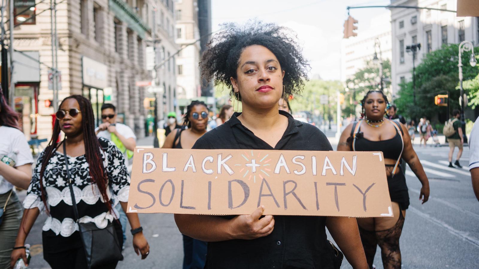 Protester from the Black-Asian solidarity march in 2022